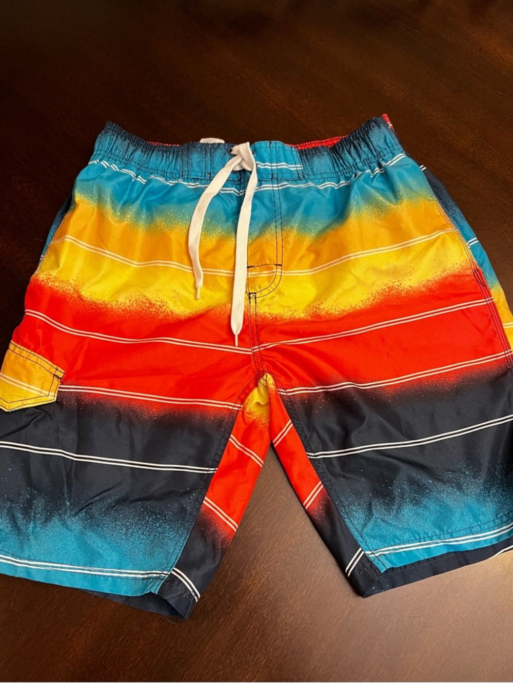 Kanu Surf Blue Yellow Red Striped Men’s Swim Trunks